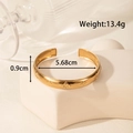 Adjustable golden hollow leaf stainless steel bangle with elegant wide band design - Four-petal Flower Geometric