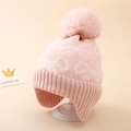 Close-up of pink knit winter hat with white jacquard patterns and a large fluffy pom-pom - One Size (3-8Y) / Light Pink