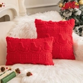 Red Christmas knit pillow cases set featuring reindeer and snowflake textured patterns - Bright Red Sled and Snowflake