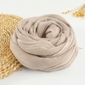 Solid beige cotton linen scarf for women rolled into a decorative flower shape - 190x100cm / Khaki
