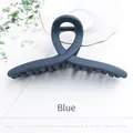 Matte dark blue large shark hair claw clip in a minimalist twisted modern design - Matte Texture / Blue