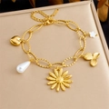 Gold plated stainless steel bracelet with daisy, heart, and faux pearl charm pendants - Daisy Heart Star and Pearl Style (B1621)