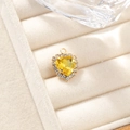Exquisite gold heart pendant featuring a brilliant yellow gemstone with diamond border - Yellow Citrine-look Pendant