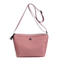 Pink nylon crossbody dumpling bag with adjustable strap and front snap pocket - Lotus root pink