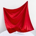 Close-up of vibrant red satin silk square scarf with glossy finish and elegant drape - 90*90cm / Red