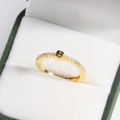 Close-up of 18k gold plated adjustable ring with letter B and sparkling crystal inlay - B Gold