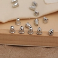 Silver metal earring backs butterfly stoppers for studs displayed on wooden bar - Metal Butterfly Style / Silver (10 Pcs)