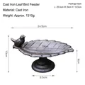 Rustic cast iron leaf bird feeder with a small bird figurine on a vintage pedestal stand - Cast Iron Leaf Bird Feeder