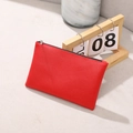 Pochette fine en cuir PU rouge à grain de litchi avec fermeture éclair pour maquillage - Rouge