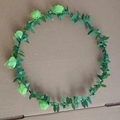 Green foam rose floral crown wreath headband featuring realistic silk leaves - Green