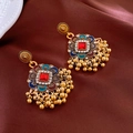 Macro view of vintage gold flower earrings with red gemstone and beaded tassel detail - Stainless Steel Post - Gold