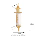 Syringe shape alloy pendant with white enamel finish and gold plated measurements - Gold White Syringe