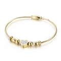 Golden cable wire bracelet with heart pendant featuring sparkling zircon pavé - Gold (KB146937-BMW)