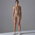 Macro shot of high-waist fitness shorts and matching crop top in nude seamless fabric - S / Cocoa