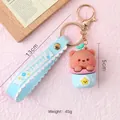 Beer sleutelhanger met lichtblauwe Summer polsband en gouden metalen ring - Cartoon Zacht PVC IJs Beer / Blauw