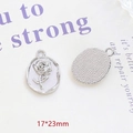 Detailed macro view of silver alloy rose pendant showing 17x23mm front and back texture - 7# Oval Rose Relief Pendant