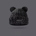 Close-up of black fuzzy beanie featuring cute bear ears and a MENG logo patch - Black