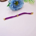 Detail of purple woven Milan cord bracelet with 18K gold-plated sliding metal clasps - Purple