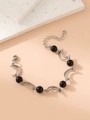 Detail of silver sun and moon chain bracelet with black beads and crescent moon links - Black Bead Moon