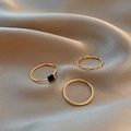 Chic 3-piece gold geometric ring set with black square stone on champagne silk fabric - Gold - 3pcs Set Black Gem