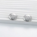 Polished silver stainless steel hoop earrings with textured geometric heart pattern finish - Round Irregular Stripes / Silver