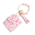 Detail eines rosa Kartenhalters mit Herzprint, Silikonperlen-Armband und Goldbeschlägen - 2# Rosa Herz