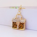 Creative gold rhinestone handbag keychain with leopard print and sparkling crystals - Yellow