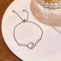 Elegant silver star and moon bracelet featuring white zircon stones and adjustable slider - S682 Silver