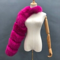 Detailed view of magenta faux fox fur shawl with tiered stitching and plush texture - Rose Red