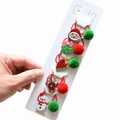 Detailed set of 5 Christmas hair ties with Santa, tree, elk, and snowman resin charms - 5-Piece Christmas Hair Tie Collection