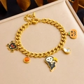 Detail of Halloween gold bracelet with skull, grim reaper, pumpkin and enamel charms - Halloween Skull Reaper Bracelet (B1441)