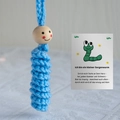 Handmade blue crochet worry worm with a wooden face bead and a German poem gift card - Blue Lucky Worm