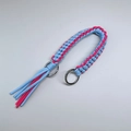 Handwoven shoulder strap in pink and blue paracord with metal rings and tassel end - Blue + Rose Red