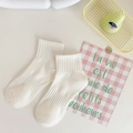 Minimalist white cotton ankle socks for women featuring ribbed texture and breathable knit - One Size / White
