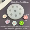 Macro shot of 8-cavity camellia silicone mold with colorful 2cm flower resin samples - 8-Hole Five Petal Flower Mold