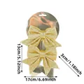 Set di 2 fiocchi natalizi dorati glitterati, 17x13cm, decorazione festiva per albero - 2 Pz/Confezione / Giallo