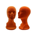 Pair of orange flocked foam mannequin heads for wig and hat display in professional studio - Flocked Mannequin Head (YCSM007-Y) / OPP Bag Packaging / Orange