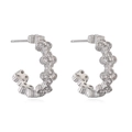 Macro view of silver clover earrings with cubic zirconia and C-shaped design - Platinum Color White Zirconia