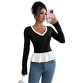 Top de punto ajustado bicolor en blanco y negro con dobladillo de volantes y manga larga - S / Negro