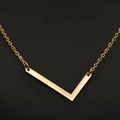 Minimalist V-shaped gold bar pendant necklace in a polished geometric metallic finish - Gold L