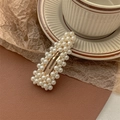 Detail of vintage faux pearl hair clip with golden alloy base and elegant bead arrangement - Water Drop Mixed Size Pearl-Gold BB Clip