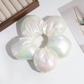 Macro shot of large 3D white satin flower hair scrunchie with iridescent pearl finish - Dazzling White (Approx. 17.5cm)