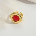 Close-up of gold adjustable ring featuring a red round gemstone and dotted texture - Gold (JZ0479 Red Stone)
