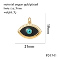 Macro detail of gold plated Evil Eye charm with 21mm x 19mm dimensions and 3mm hole size - P01741 Medium Black Blue Eye