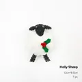 Christmas sheep plush ornament with holly leaf decoration and white hanging rope, size 13x8.5cm - Holly Lamb