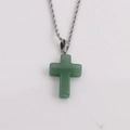 Detail shot of green natural stone cross pendant with silver twisted rope chain necklace - Green Aventurine