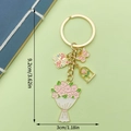 Pink floral butterfly keychain with Mrs. charm and gold alloy detailing for bags - Pink Rose Butterfly (ER1551)