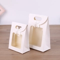 White kraft paper gift bags with clear window and silk bow in two versatile sizes - White