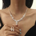 Elegant silver teardrop necklace and earrings set with shimmering rhinestones on a model - Geometric V-Shape Rhinestone Set (DTN14026157S)