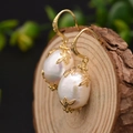 Elegant baroque pearl drop earrings with golden leaf accents and 18k gold plating - Baroque Pearl Style